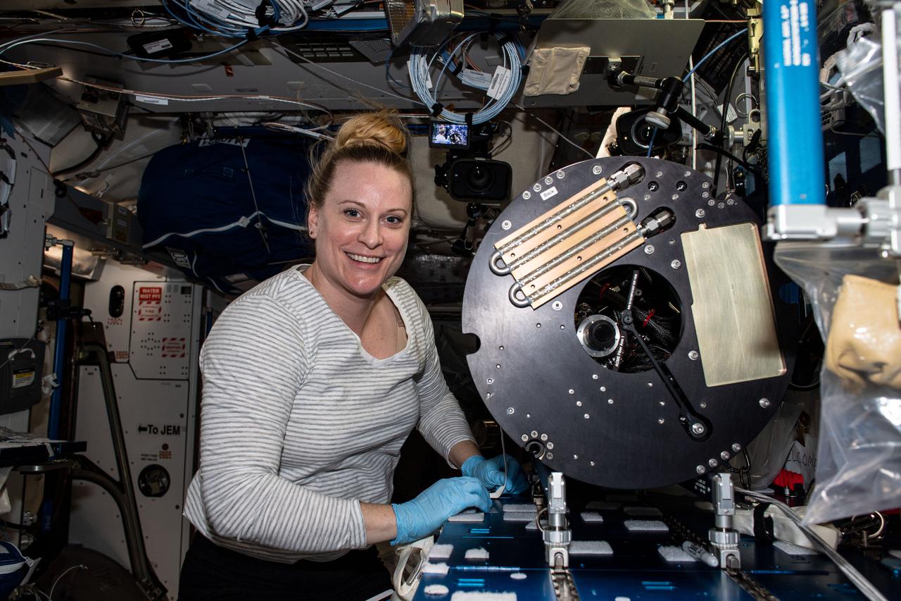 iss064e025973 (Jan., 25, 2021) --- NASA astronaut and Expedition 64 Flight Engineer Kate Rubins services hardware inside the Unity module to support a suite of combustion investigations known as Advanced Combustion Microgravity Experiments, or ACME. The ACME project is a set of six independent studies of gaseous flames that may help to improve fuel efficiency, reduce pollution and prevent spacecraft fires.