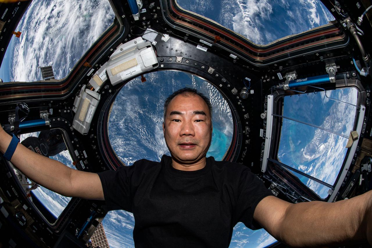 JAXA (Japan Aerospace Exploration Agency) astronaut and Expedition 64 Flight Engineer Soichi Noguchi is seen in the cupola of the International Space Station, with the Gulf of Mexico in the background.