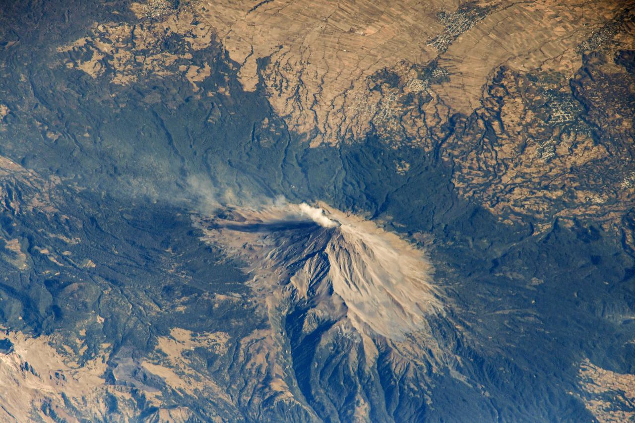 iss064e026423 (Jan. 25, 2021) --- The active volcano of Popocatépetl is pictured from the International Space Station as it orbited 261 miles above central Mexico. Credit: Roscosmos