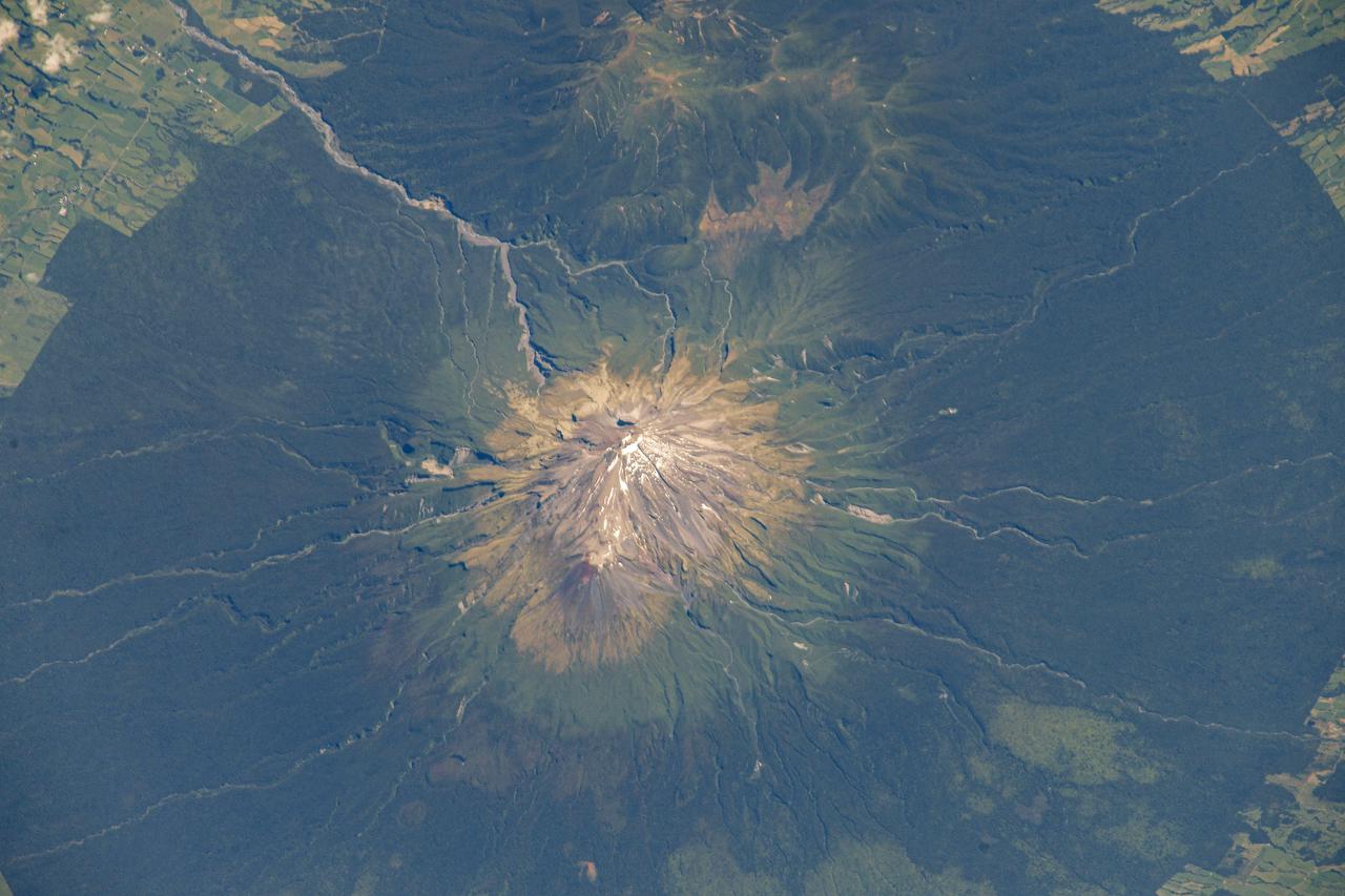 iss064e026424 (Jan. 25, 2021) --- Mount Taranaki on the island nation of New Zealand is pictured from the International Space Station as it orbited 268 miles above the South Pacific. Credit: Roscosmos