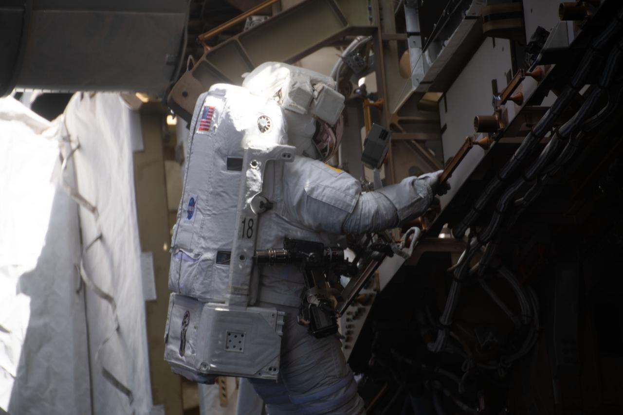 iss064e027903 (Feb. 1, 2021) --- NASA astronaut Victor Glover is pictured during a spacewalk to complete battery upgrade work on the outside of the International Space Station with fellow NASA astronaut Michael Hopkins (out of frame).