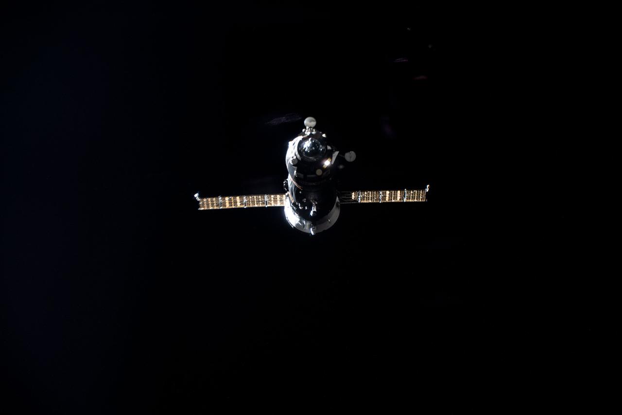 iss064e033785 (Feb. 17, 2021) --- Russia's uncrewed ISS Progress 77 resupply ship is pictured approaching its docking port on the International Space Station's Pirs docking compartment.