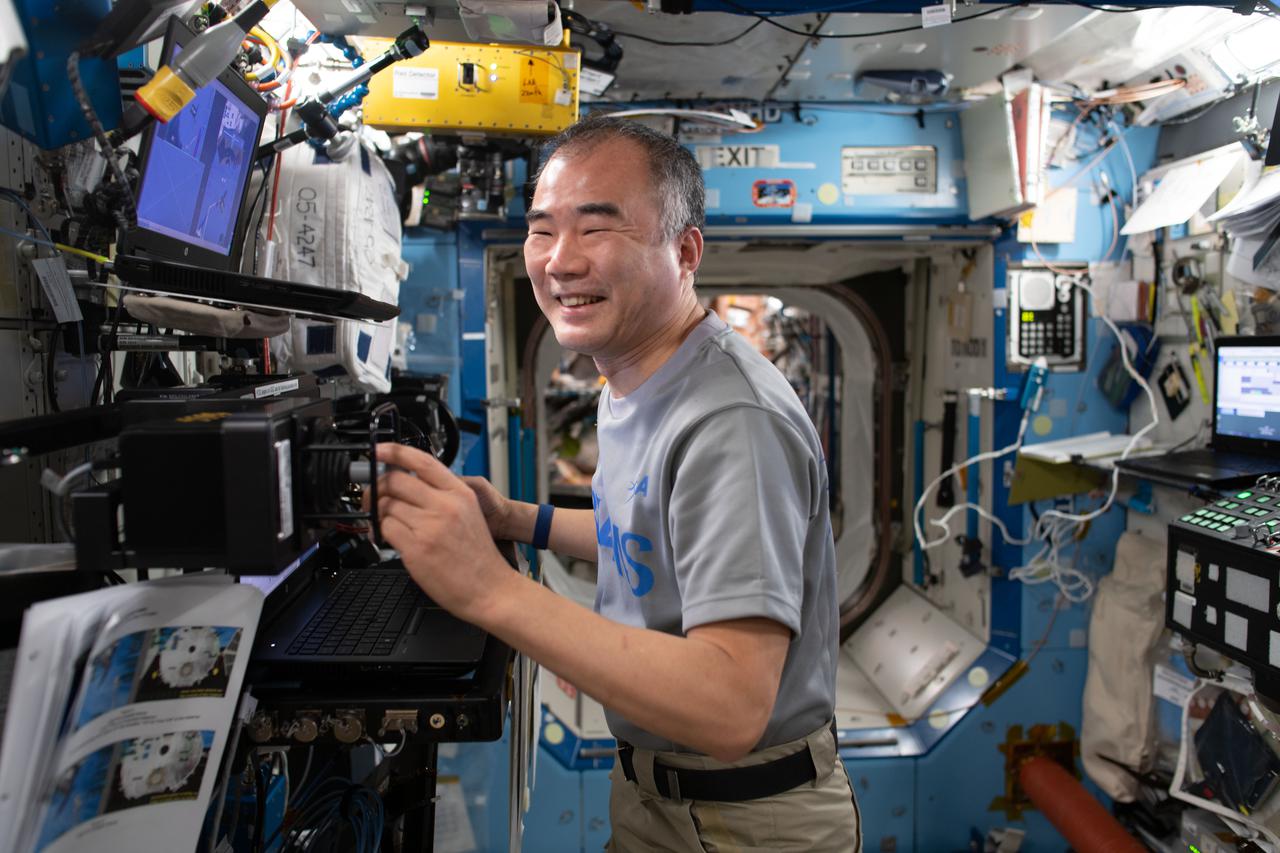 iss064e035633 (Feb. 23, 2021) --- JAXA (Japan Aerospace Exploration Agency) astronaut and Expedition 64 Flight Engineer Soichi Noguchi is pictured during training activities on the robotics work station, which controls the Canadarm2 robotic arm, located inside the International Space Station's U.S. Destiny laboratory module.