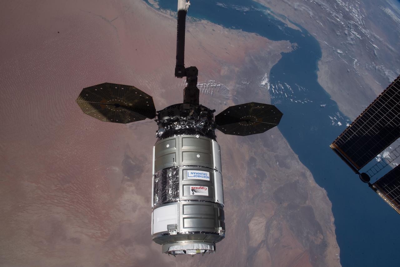 iss064e035964 (Feb. 22, 2021) --- The Cygnus space freighter from Northrop Grumman is pictured moments after its capture with the Canadarm2 robotic arm as the International Space Station was orbiting 262 miles above Oman.