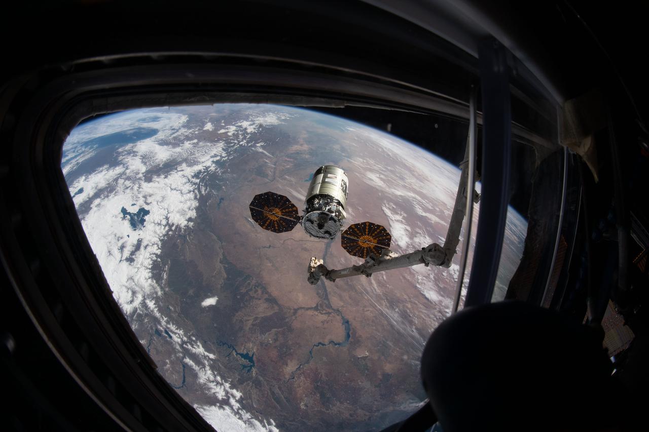 iss064e036104 (Feb. 22, 2021) --- The Cygnus space freighter from Northrop Grumman is pictured moments before its capture with the Canadarm2 robotic arm. Cygnus and the International Space Station were both orbiting 263 miles above Turkey in this photograph taken from inside the cupola.