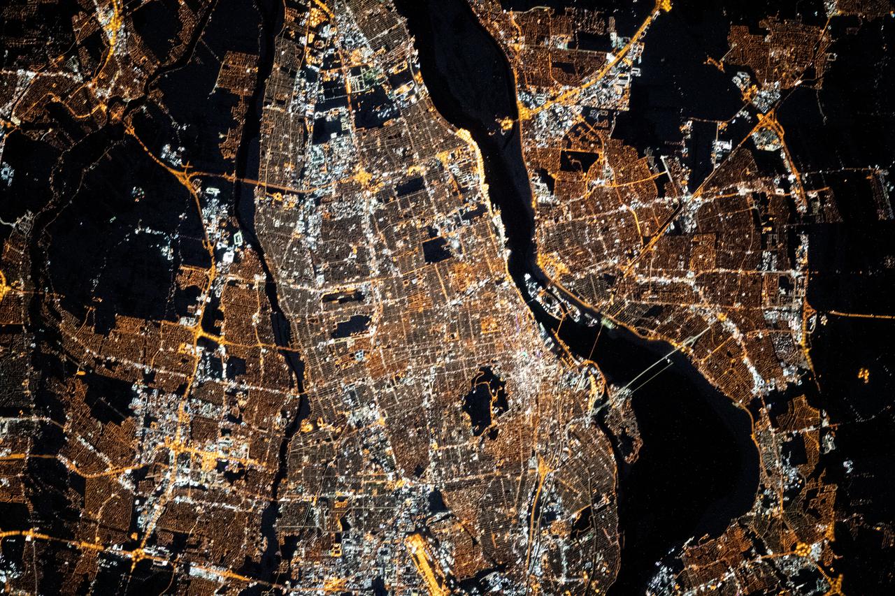 iss064e038000 (Feb. 26, 2021) --- The city lights of Montreal are pictured from the International Space Station as it orbited 262 miles above Quebec, Canada.