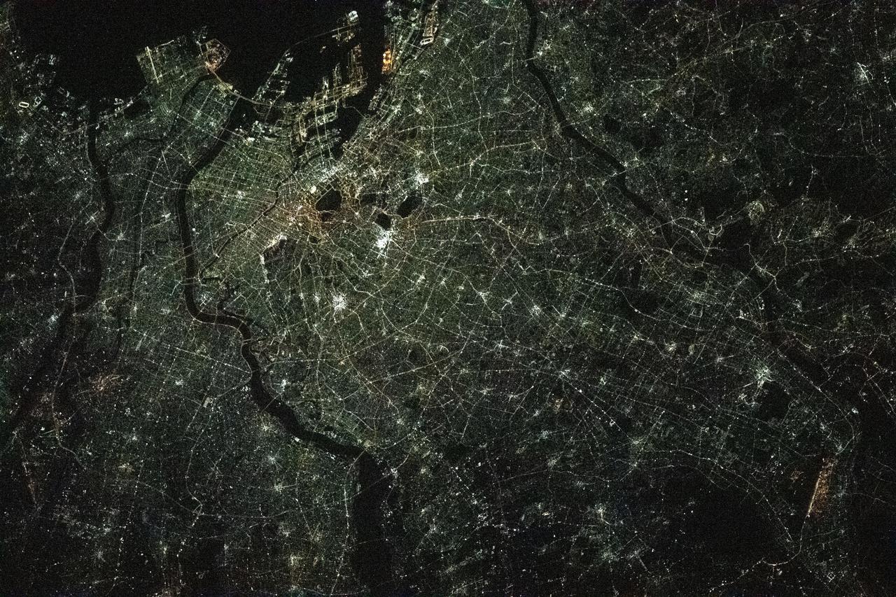 iss064e038775 (Feb. 27, 2021) --- The night lights of Tokyo, Japan, are pictured from the International Space Station as it orbited 261 miles above the island nation.