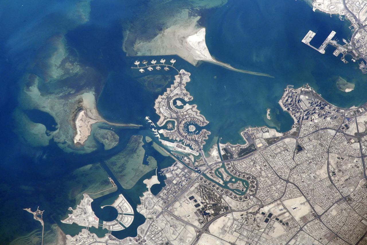 iss064e039348 (Feb. 26, 2021) --- Doha, Qatar, is pictured from the International Space Station as it orbited 261 miles above the United Arab Emirates. Credit: Roscosmos