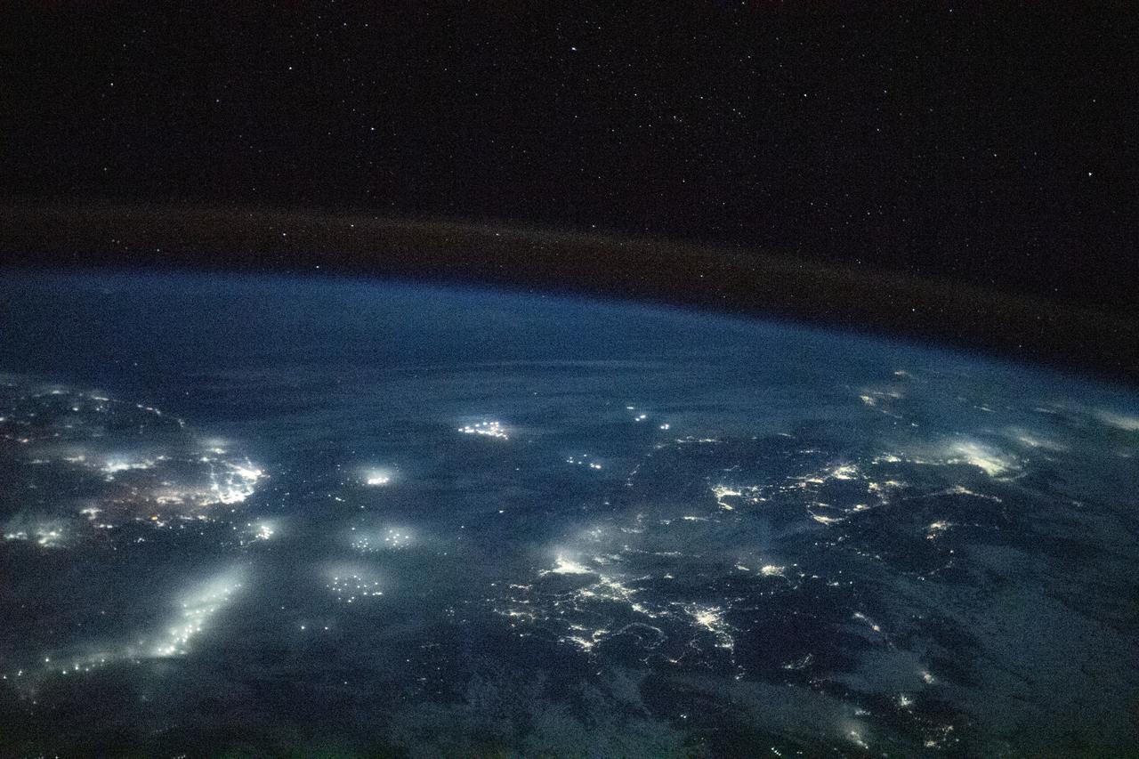 iss064e039403 (March 3, 2021) --- The well-lit nations of South Korea and Japan, as well as the lights of fishing boats in the East China Sea, are pictured from the International Station as it orbited 260 miles above.