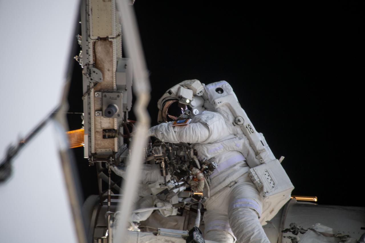 iss064e039894 (March 5, 2021) --- JAXA (Japan Aerospace Exploration Agency) astronaut Soichi Noguchi is pictured during a spacewalk to install solar array modification kits to ready the International Space Station for newer, more powerful solar arrays being delivered on upcoming SpaceX Dragon cargo missions.