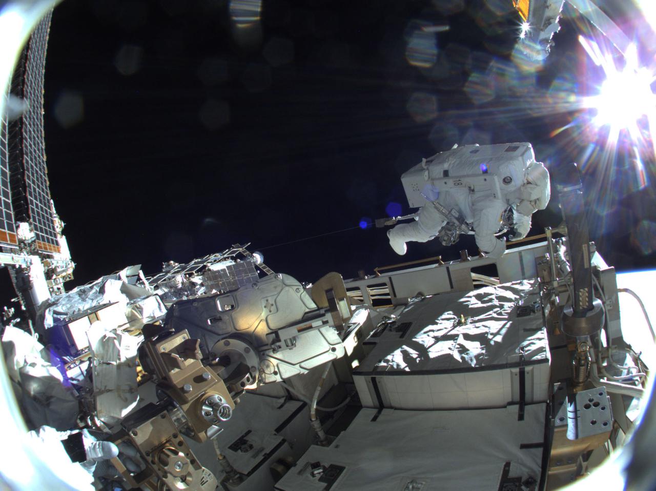 iss064e040058 (March 5, 2021) --- JAXA (Japan Aerospace Exploration Agency) astronaut Soichi Noguchi is pictured during a spacewalk to install solar array modification kits to ready the International Space Station for newer, more powerful solar arrays being delivered on upcoming SpaceX Dragon cargo missions.