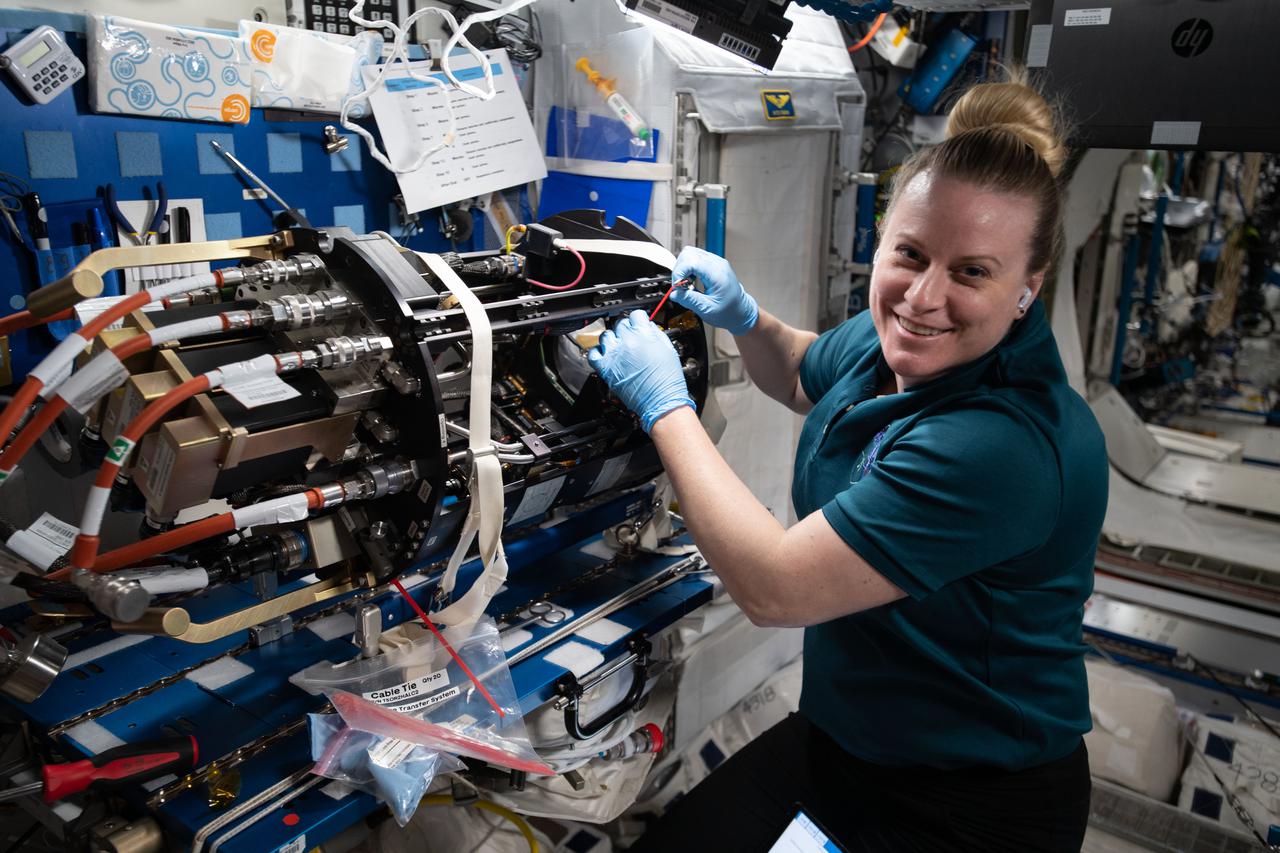 iss064e040953 (March 9, 2021) --- NASA astronaut and Expedition 64 Flight Engineer Kate Rubins replaces and cleans hardware supporting a suite of studies known as ACME, or Advanced Combustion via Microgravity Experiments, located in the Combustion Integrated Rack. Rubins performs the work on ACME's chamber insert in the Unity module's Maintenance Work Area.