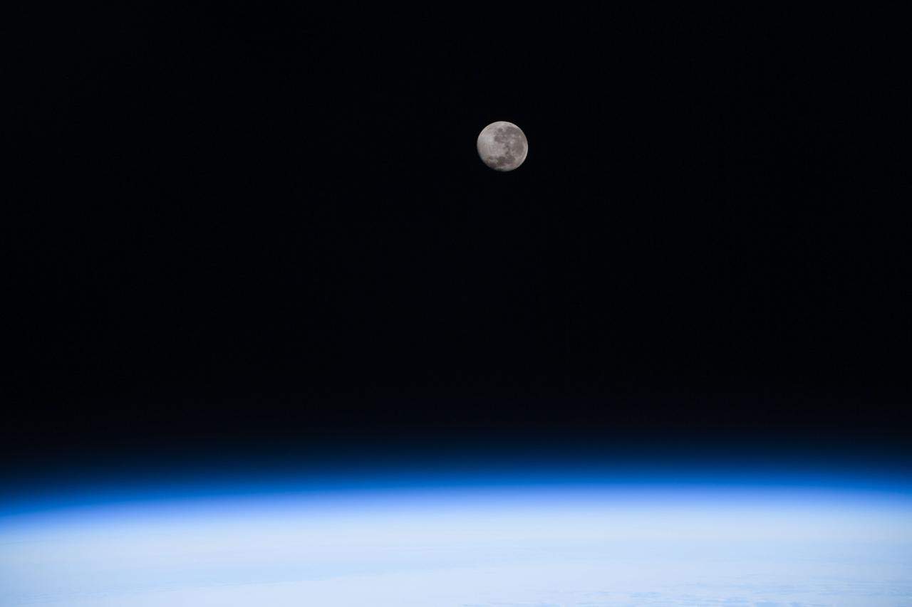 iss064e049348 (March 30, 2021) --- A waning gibbous Moon is pictured above the Earth's horizon as the International Space Station orbited 270 miles above the Atlantic Ocean off the coast of Argentina.