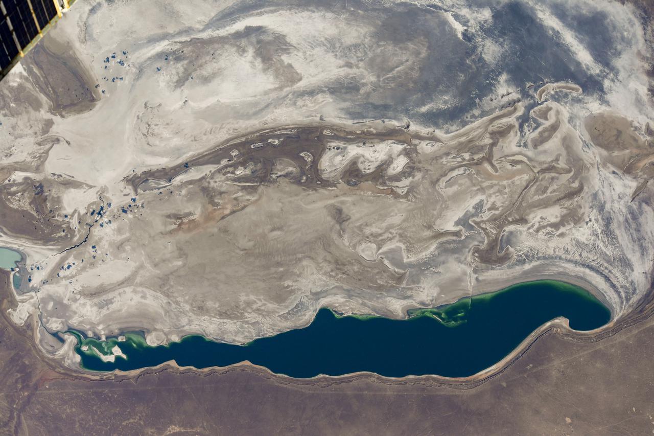 iss064e051072 (March 31, 2021) --- The Aral Sea, which has been shrinking since the 1960's due to agricultural activity, stretches from Uzbekistan in the south to Kazakhstan in the north and was pictured from the International Space Station as it orbited 264 miles above. Credit: Roscosmos