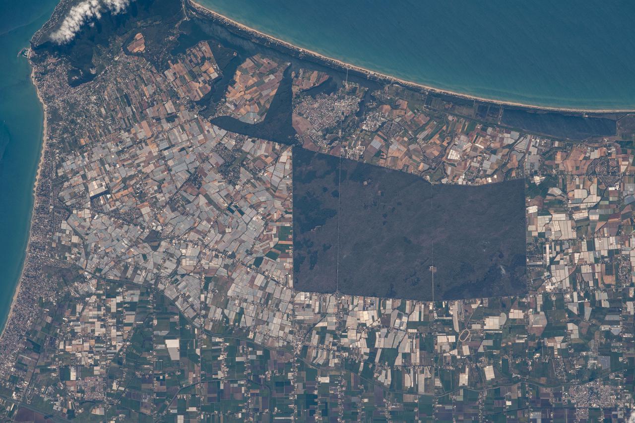 iss064e051271 (April 2, 2021) --- Sabaudia, an Italian province south of Rome, is pictured on the coast of the Tyrrhenian Sea as the International Space Station orbited 264 miles above.