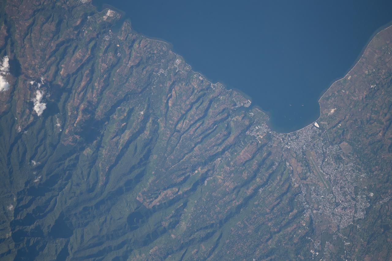 iss065e001270 (April 21, 2021) --- The north coast of West Nusa Tenggara, a province of Indonesia, on the Flores Sea is pictured from the International Space Station as it orbited 262 miles above.
