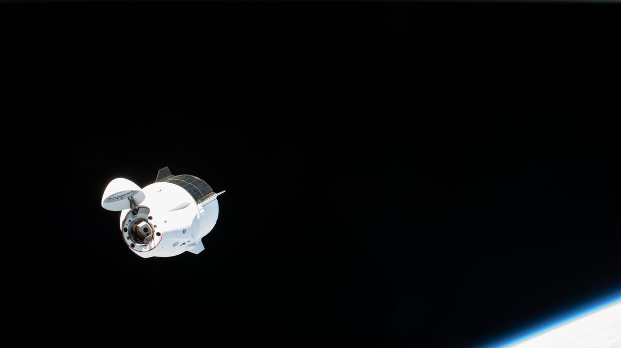 iss065e002848 (April 24, 2021) --- The SpaceX Crew Dragon Endeavour is pictured approaching the International Space Station as both spacecraft orbited 261 miles above the Arabian Sea.