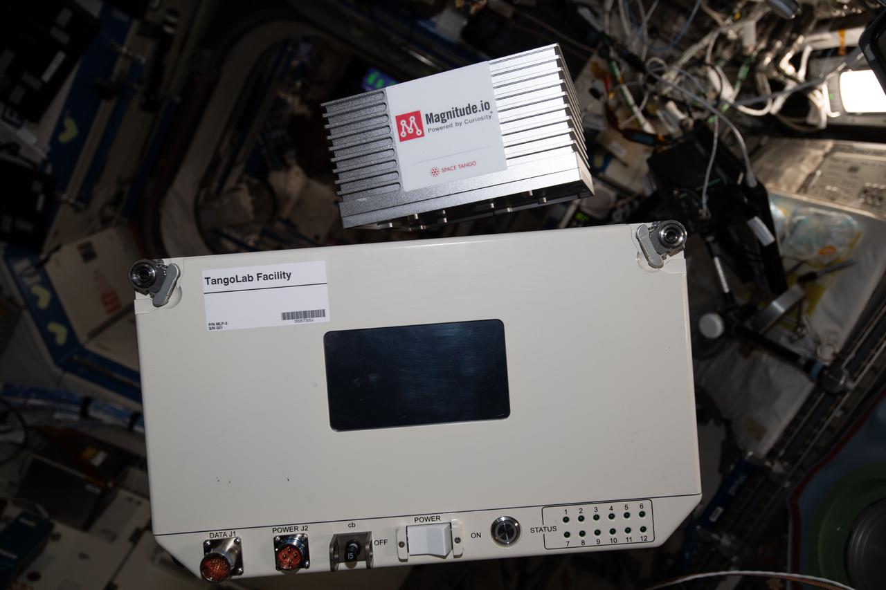 iss065e004334 (4/25/2021) --- A view of the TangoLab Facility with the Space Tango CubeLab for the Nitrogen Fixation of Leguminous Species in MicroG (Symbiotic Leguminous Nitrogen Fixation) investigation. Symbiotic Leguminous Nitrogen Fixation explores the effects of microgravity on the growth and development of legumes, plants capable of biological nitrogen fixation with symbiotic bacteria.