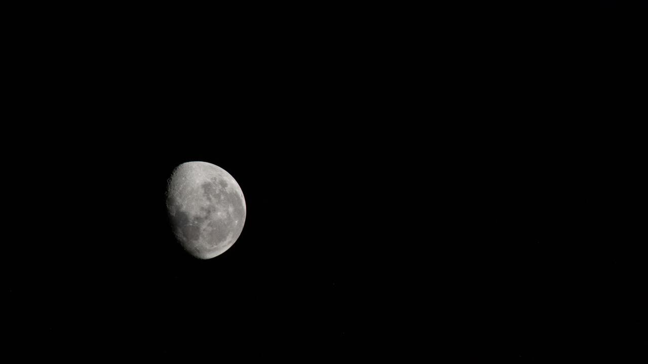 iss065e011352 (May 3, 2021) --- An external high-definition camera on the International Space Station captured this view of a waning gibbous Moon.