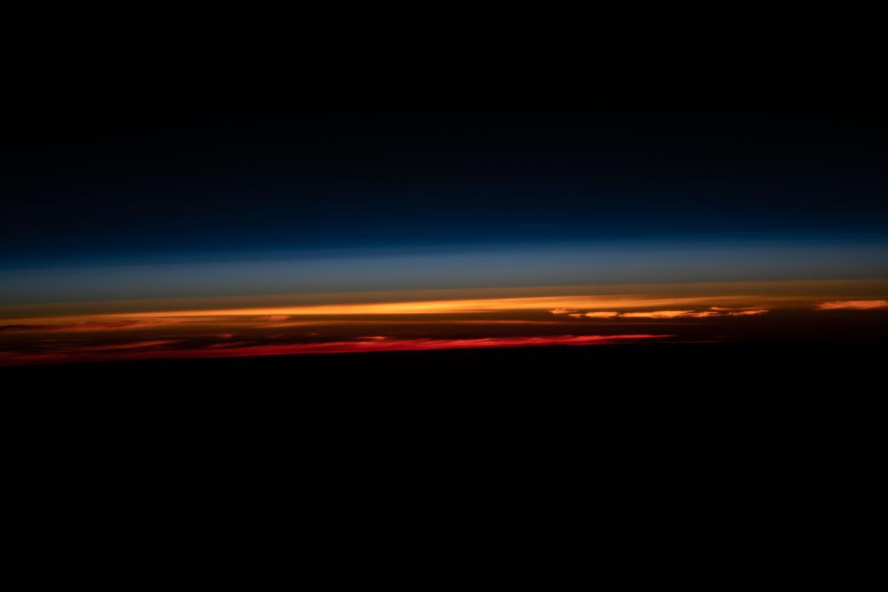 iss065e018758 (May 3, 2021) --- A sunset is pictured above the Earth's horizon as the International Space Station orbited 269 miles above the Atlantic Ocean near the southern coast of Argentina.