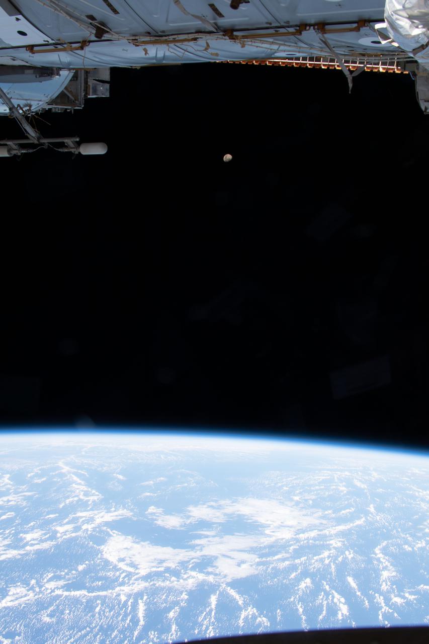 iss065e053289 (May 23, 2021) --- A waxing gibbous Moon is pictured from the International Space Station as it orbited 263 miles above the Pacific Ocean.