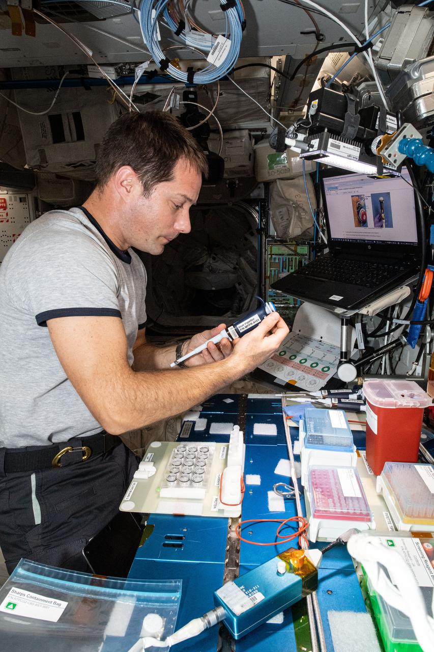 iss065e066472 (May 24, 2021) --- Expedition 65 Flight Engineer Thomas Pesquet of ESA (European Space Agency) services samples for the Real Time Protein Crystal Growth experiment. The biotechnology study demonstrates new methods for producing high-quality protein crystals in microgravity to potentially develop better drugs to treat a variety of diseases on Earth and advance the commercialization of space.