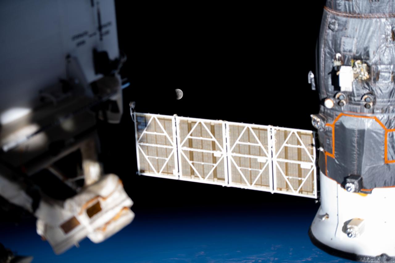 iss065e074503 (May 26, 2021) --- The Moon pictured during a lunar eclipse is seen from the International Space Station during a northwest to southeast orbital trek 263 miles above the Pacific Ocean.