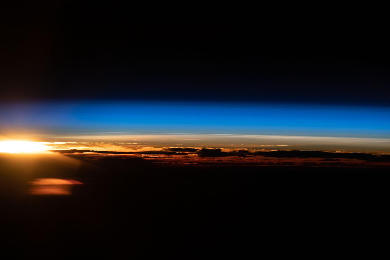iss065e081845 (May 20, 2021) --- An orbital sunrise is pictured from the International Space Station as it soared 265 miles above the Indian Ocean off the coast of Western Australia.