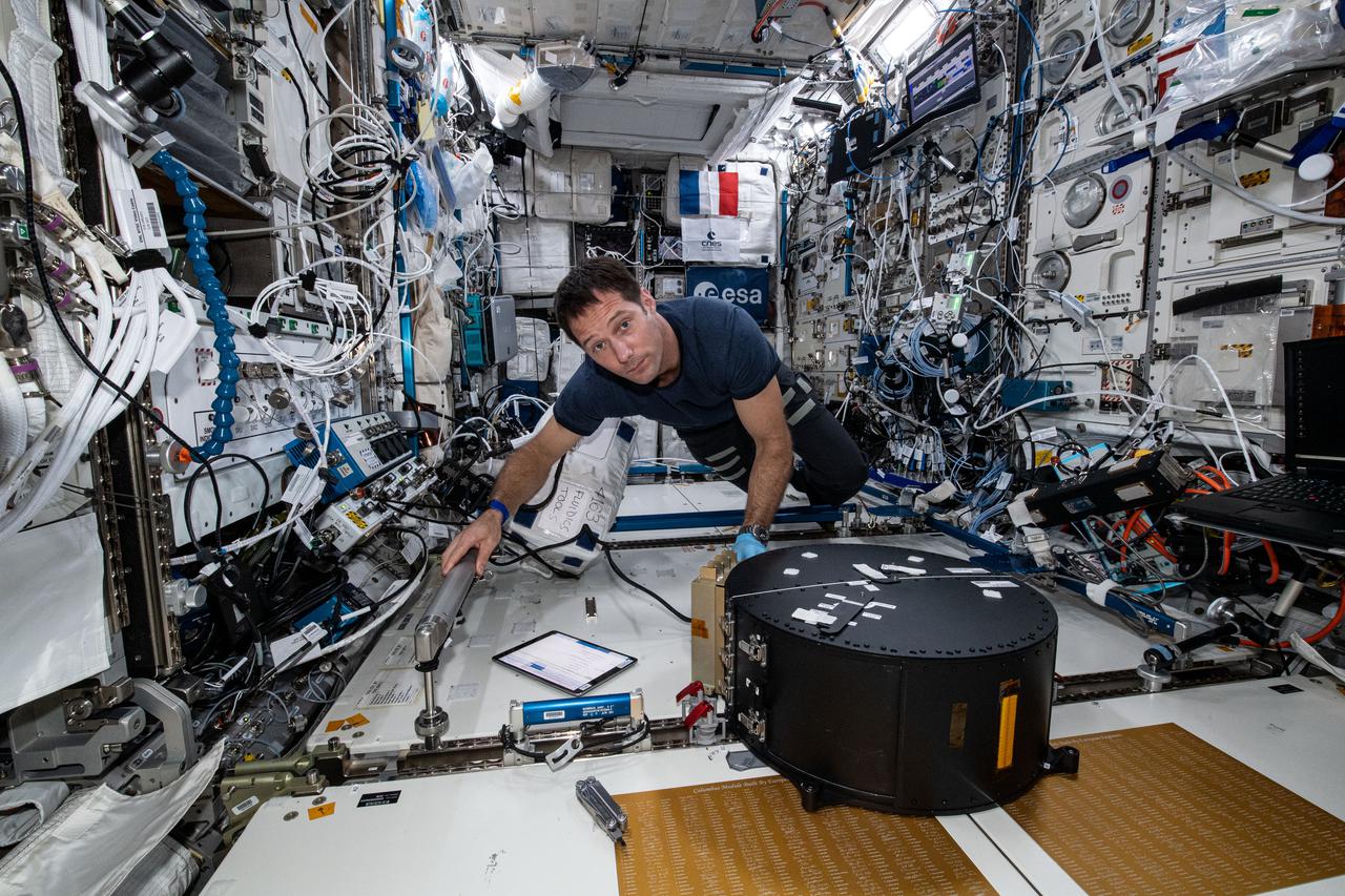 iss065e084793 (June 1, 2021) --- Expedition 65 Flight Engineer Thomas Pesquet of ESA (European Space Agency) works inside the Columbus laboratory module to closeout the Fluidics study. The fluid physics investigation, sponsored by ESA, may lead to the development of better fuel systems for satellites and provide for longer satellite lifetime by better managing use of fuel for maneuvering.