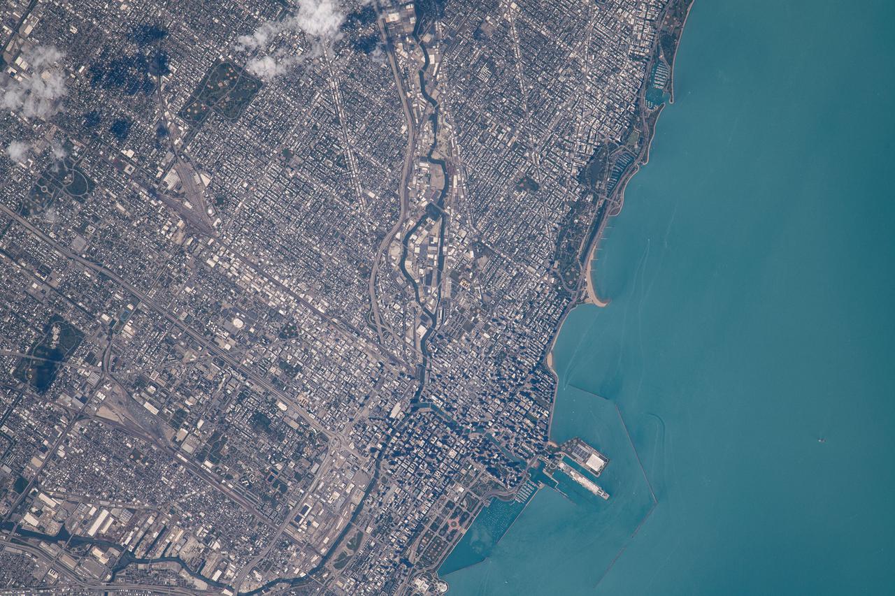 iss065e086284 (June 3, 2021) --- Chicago, Illinois, is pictured from the International Space Station as it orbited 262 miles above Lake Michigan.