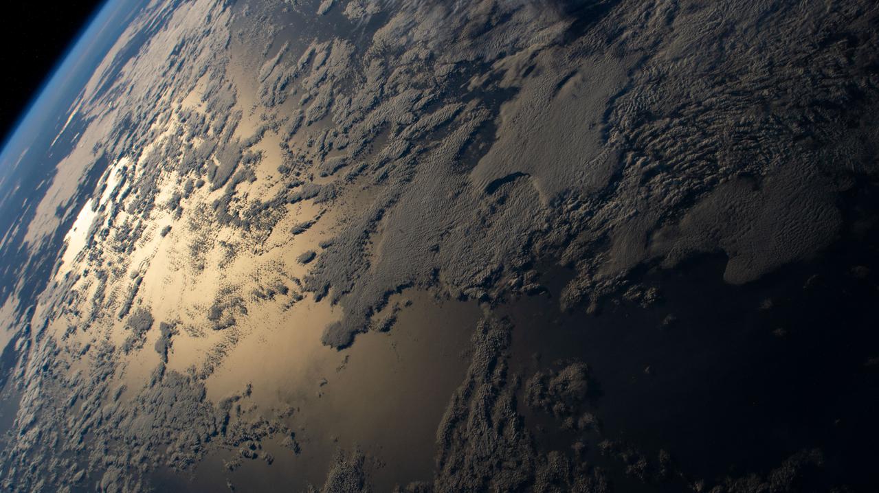 iss065e086377 (June 3, 2021) --- The sun's glint beams off the Indian Ocean as the International Space Station orbited 269 miles above south of Western Australia.