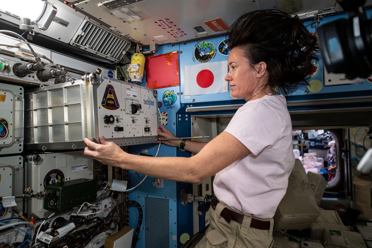 iss065e093498 (June 7, 2021) --- NASA astronaut Megan McArthur installs a new ADSEP-2 (Advanced Space Experiment Processor-2) containing ADSEP-UMAMI samples inside the Kibo laboratory module aboard the International Space Station (ISS).  The Understanding of Microgravity on Animal-Microbe Interactions (UMAMI) investigation examines the effects of spaceflight on the molecular and chemical interactions between beneficial microbes and their animal hosts.  The ADSEP-2 facility supports observations of biological or physical samples and can also be operated aboard the Cargo Dragon and Northrop Grumman Cygnus resupply ships.