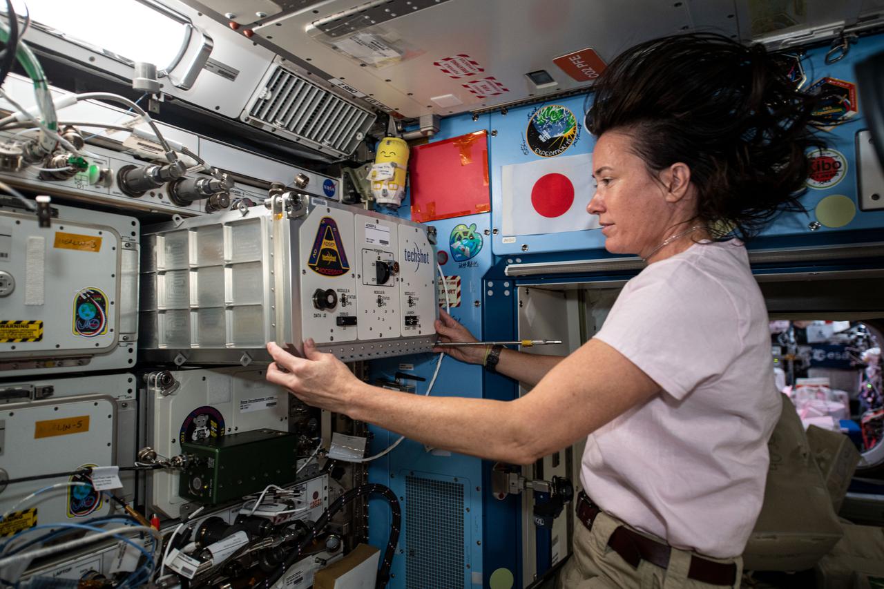 iss065e093499 (June 7, 2021) --- NASA astronaut and Expedition 65 Flight Engineer Megan McArthur installs a new research device, recently delivered aboard the SpaceX Cargo Dragon vehicle, inside the Kibo laboratory module. Known as the ADSEP-2, or Advanced Space Experiment Processor-2, the science facility supports observations of biological or physical samples and can also be operated aboard the Cargo Dragon and Northrop Grumman Cygnus resupply ships.