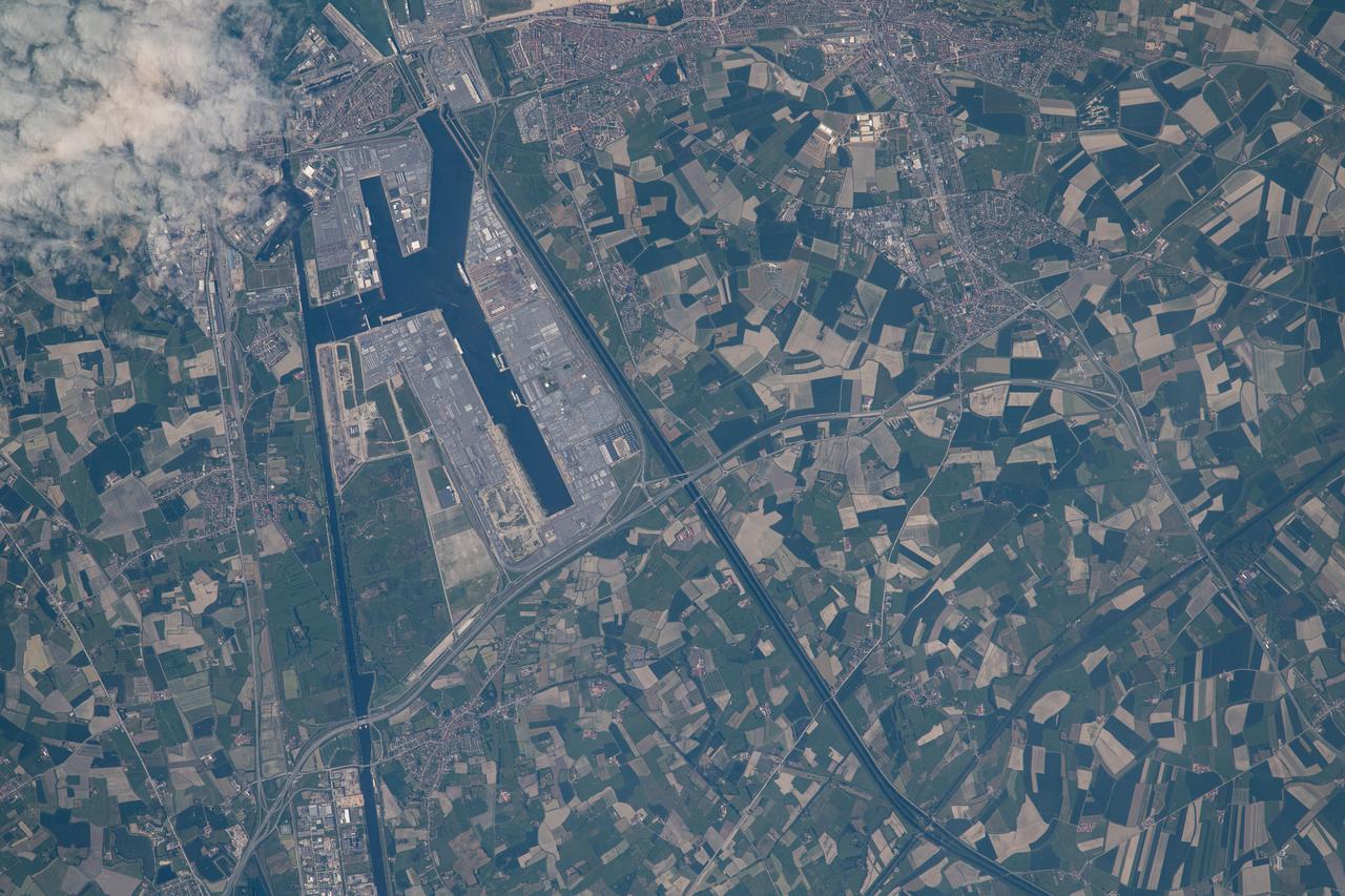 iss065e096048 (June 10, 2021) --- Zeebrugge, a Belgian port and seaside resort on the North Sea coast, is pictured from the International Space Station as it orbited 263 miles above northern Europe.