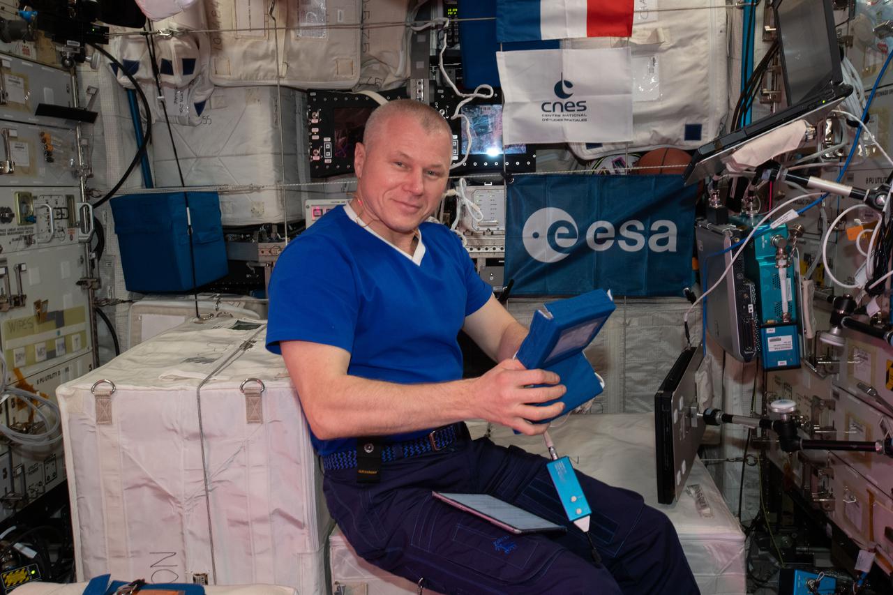 iss065e124411 (June 18, 2021) --- Roscosmos cosmonaut and Expedition 65 Flight Engineer Oleg Novitskiy works inside the Columbus laboratory module conducting research for the Plasma Kristall-4 experiment. The space physics study explores low temperature gaseous mixtures composed of ionized gas, neutral gas, and micron-sized particles possibly leading to new research methods or improved spacecraft designs.
