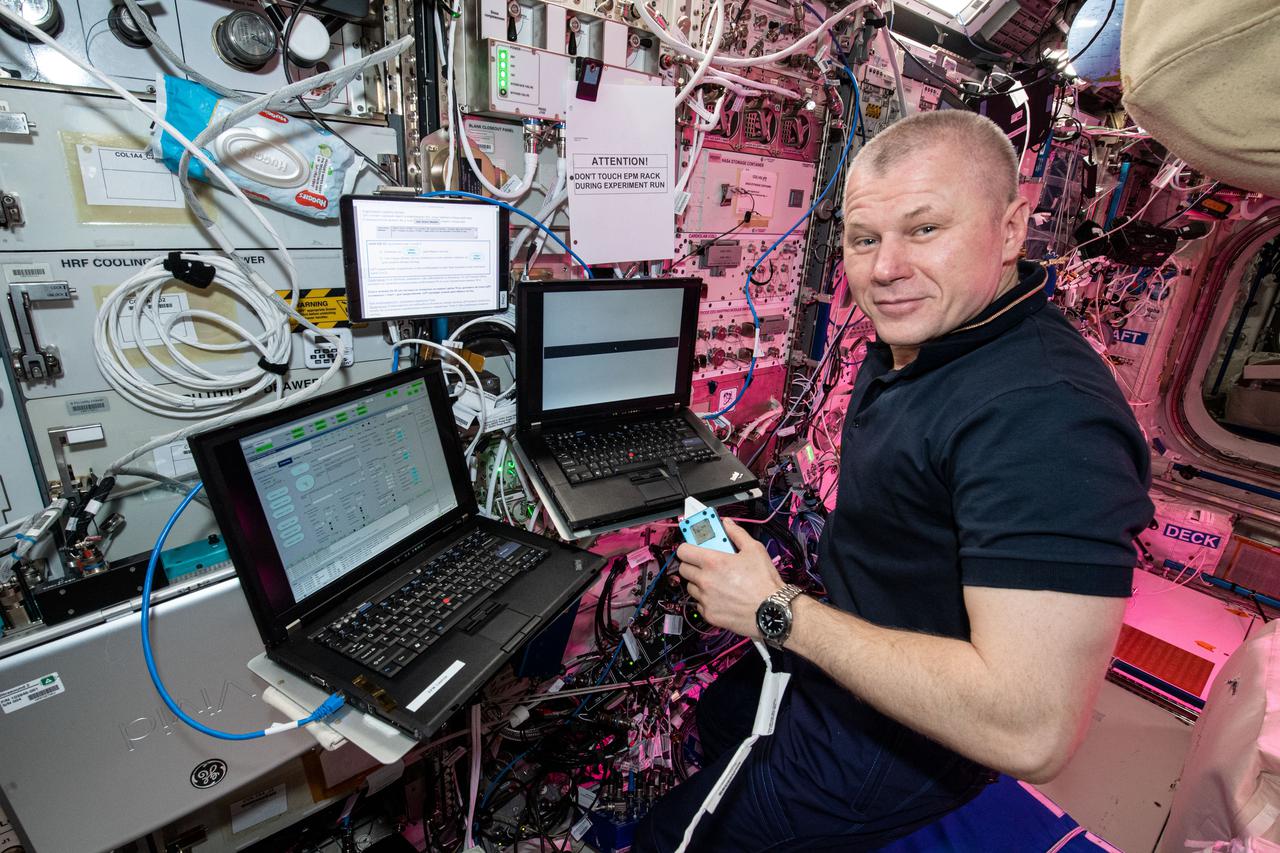 iss065e148694 (June 22, 2021) --- Roscosmos cosmonaut and Expedition 65 Flight Engineer Oleg Novitskiy conducts research activities inside the Columbus laboratory module from ESA (European Space Agency) for the Plasma Kristall-4 experiment possibly leading to new research methods or improved spacecraft designs.