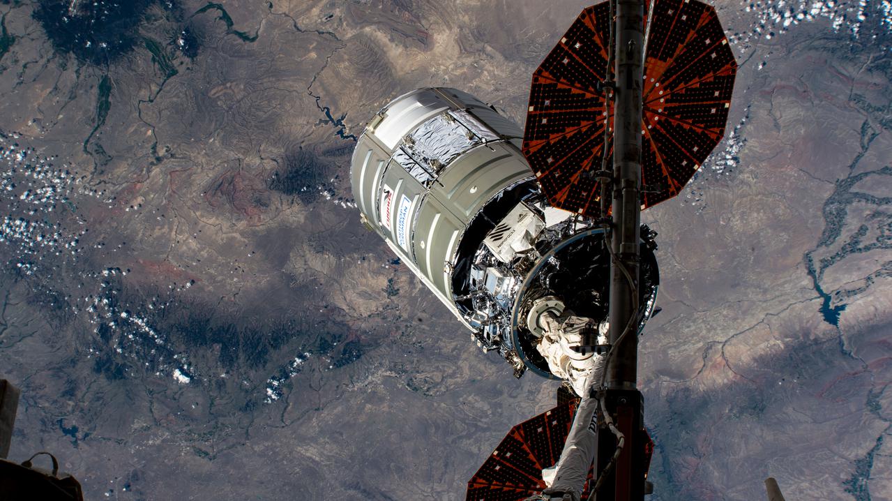 iss065e152560 (June 29, 2021) --- The Cygnus space freighter from Northrop Grumman is pictured the moment it was released from the Canadarm2 robotic arm over southern Wyoming in the United States completing a four-month cargo mission at the International Space Station.