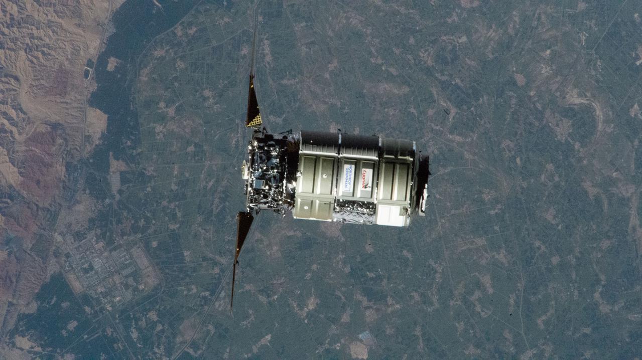 iss065e238816 (Aug. 12, 2021) --- Northrop Grumman's Cygnus space freighter, carrying over 8,200 pounds of cargo to resupply the Expedition 65 crew, approaches the International Space Station for a capture with the Canadarm2 robotic arm operated by NASA Flight Engineer Megan McArthur. The orbital lab was flying 264 miles above China near the border of Mongolia at the time of this photograph.