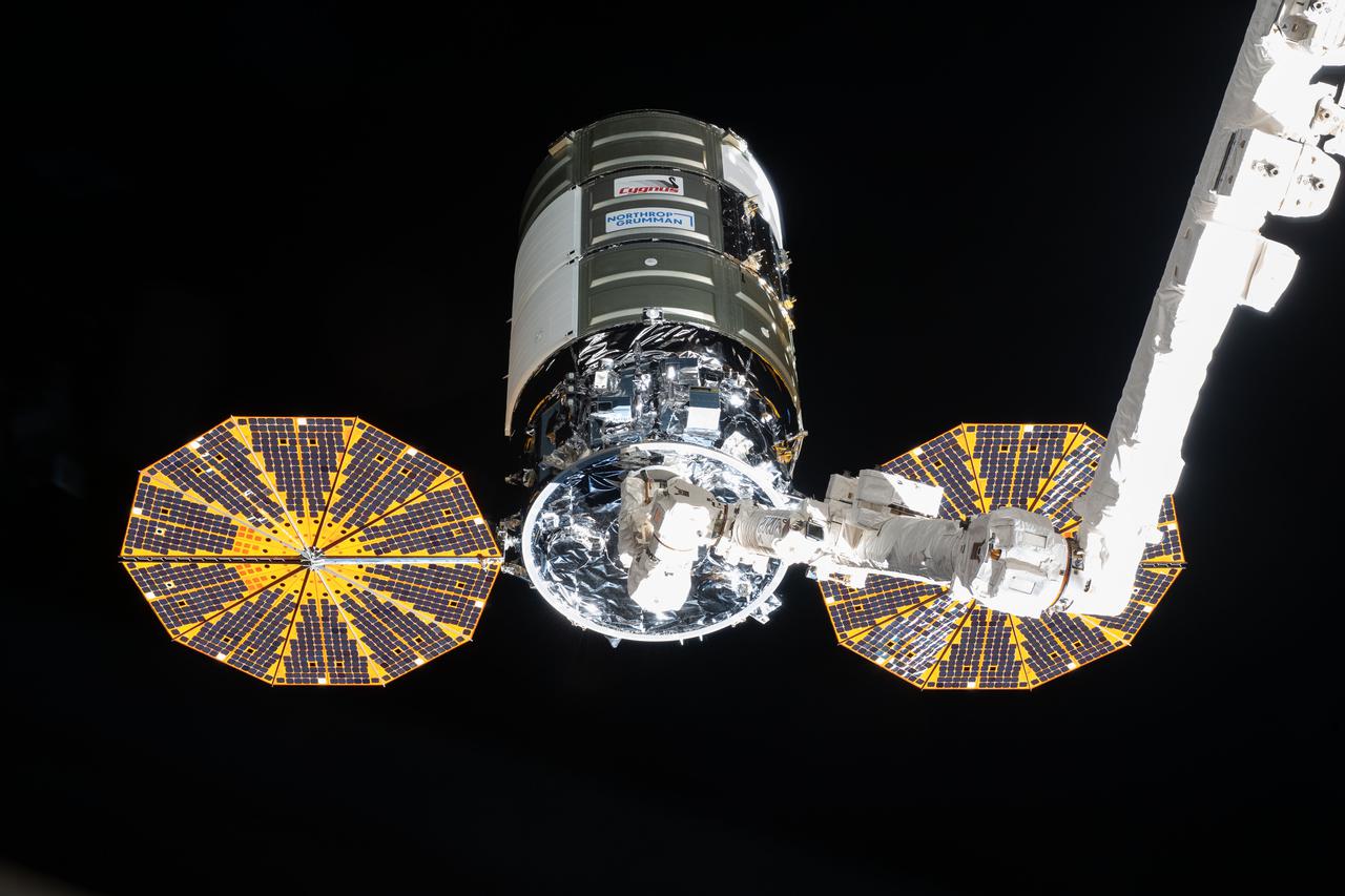 iss065e241432 (Aug. 12, 2021) --- Northrop Grumman's Cygnus space freighter is pictured shortly after it was captured in the grips of the Canadarm2 robotic arm operated NASA Flight Engineer Megan McArthur.