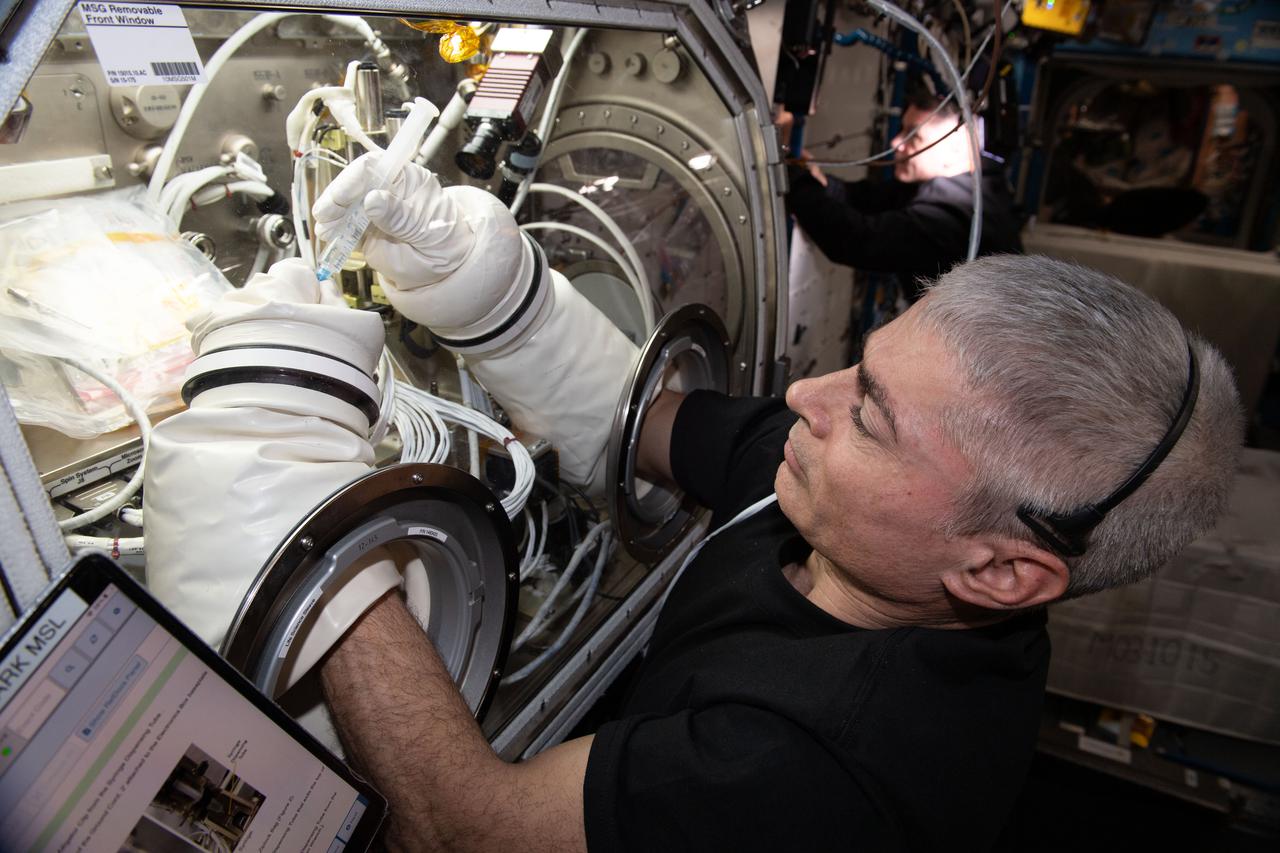 iss065e257447 (Aug. 17, 2021) --- NASA Astronaut and Expedition 65 Flight Engineer Mark Vande Hei works on the Ring Sheared Drop investigation in the Microgravity Science Glovebox (MSG) aboard the International Space Station. This experiment leverages the microgravity environment of the orbiting laboratory to study proteins associated with neurodegenerative diseases such as Alzheimer's and Parkinson's. The research may contribute to a better understanding of these diseases and development of potential treatments.
