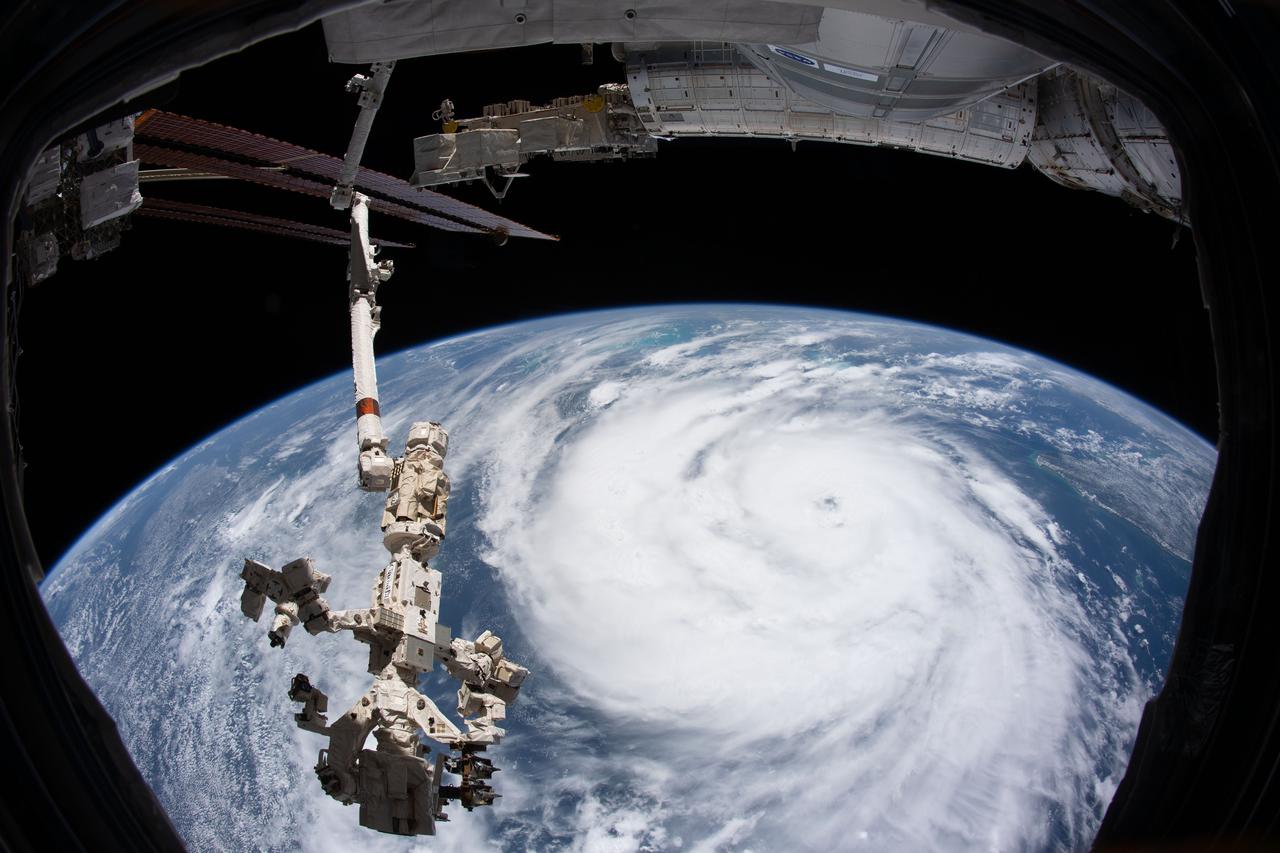 iss065e319494 (Aug. 28, 2021) --- Hurricane Ida is pictured as a category 2 storm from the International Space Station as it orbited 264 miles above the Gulf of Mexico. In the foreground, is the Canadarm2 robotic arm with Dextre, the fine-tuned robotic hand, attached.