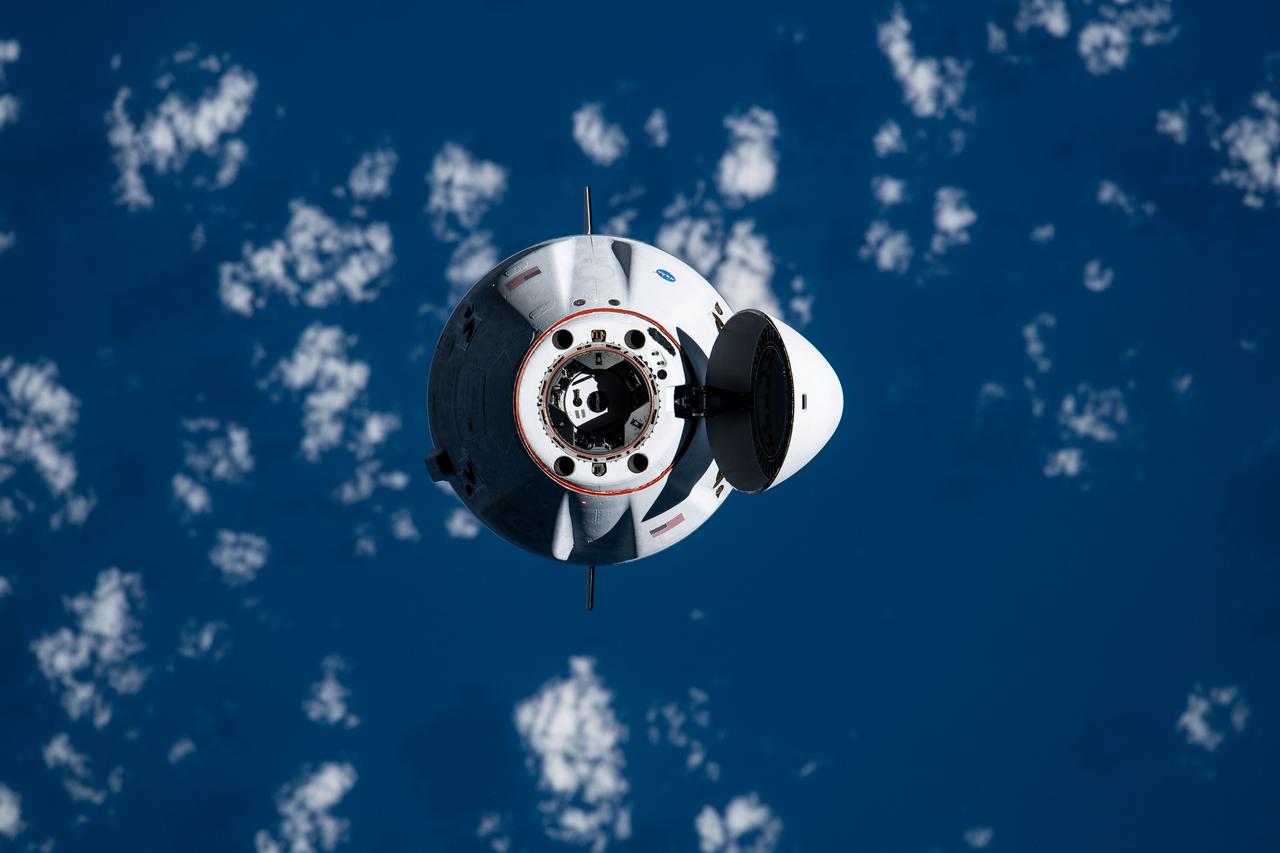 iss065e327831 (Aug. 30, 2021) --- The SpaceX Cargo Dragon vehicle approaches the International Space Station for an autonomous docking to the Harmony module's forward international docking adapter.