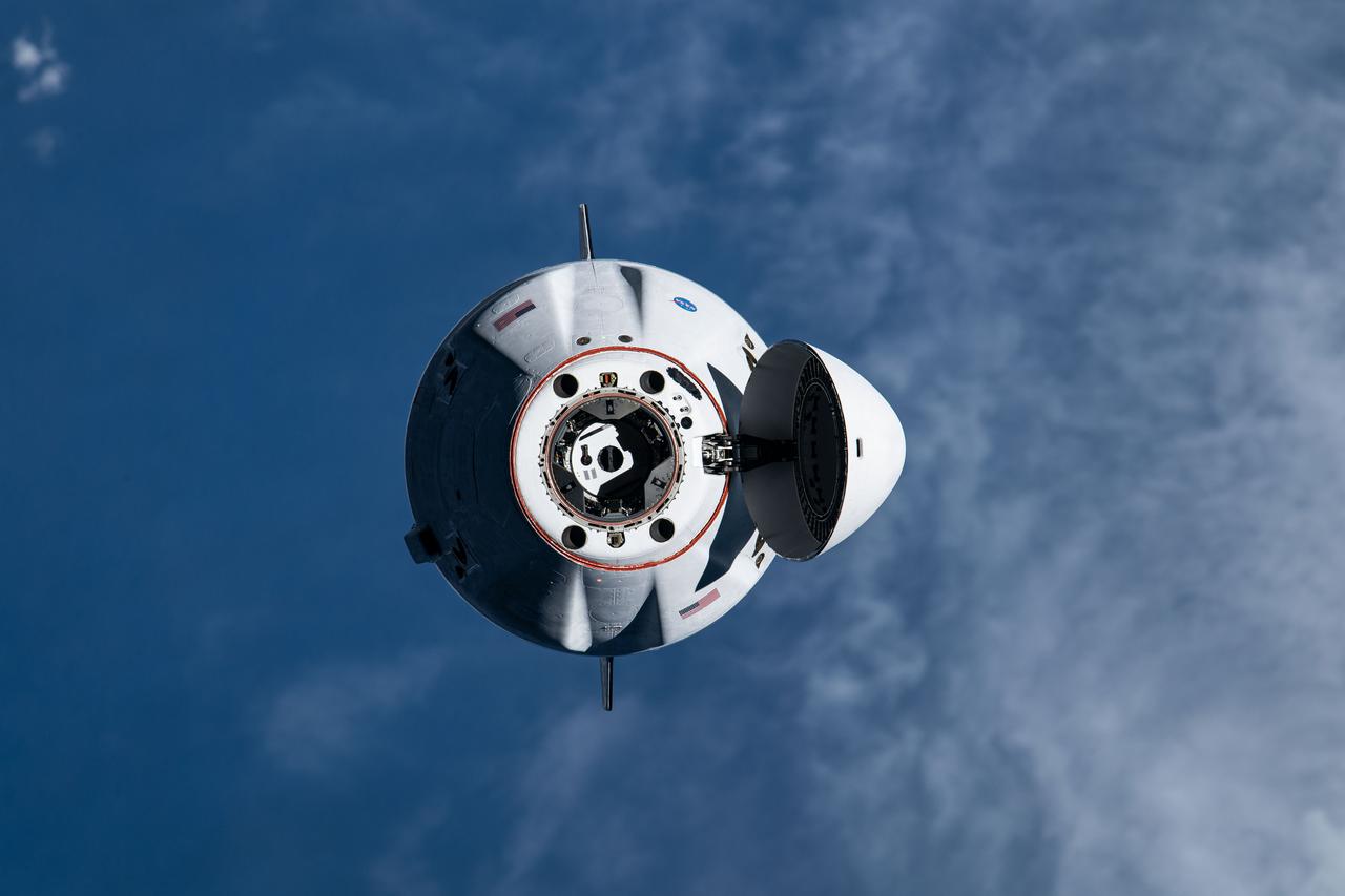 iss065e327939 (Aug. 30, 2021) --- The SpaceX Cargo Dragon vehicle approaches the International Space Station for an autonomous docking to the Harmony module's forward international docking adapter.