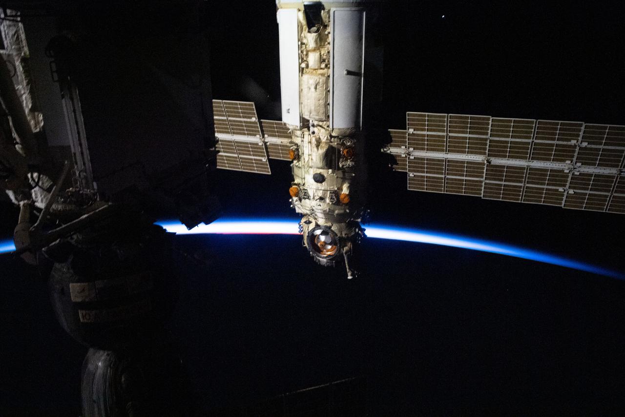 iss065e329698 (Aug. 21, 2021) --- Russia's Nauka multipurpose laboratory module is pictured as the International Space Station orbited into a sunset 271 miles above the southern Indian Ocean in between South Africa and Antarctica.