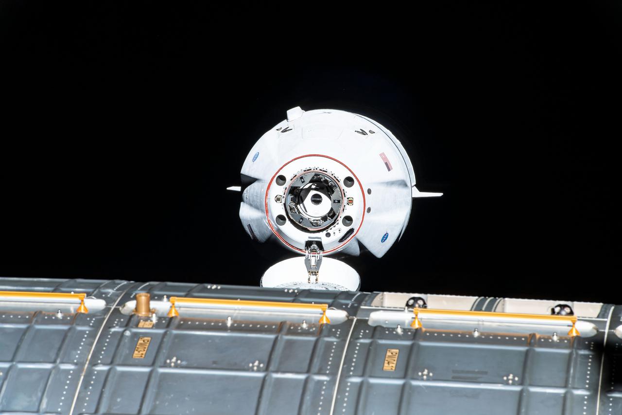 iss065e333833 (Aug. 30, 2021) --- The SpaceX Cargo Dragon vehicle approaches the International Space Station for an autonomous docking to the Harmony module's forward international docking adapter.