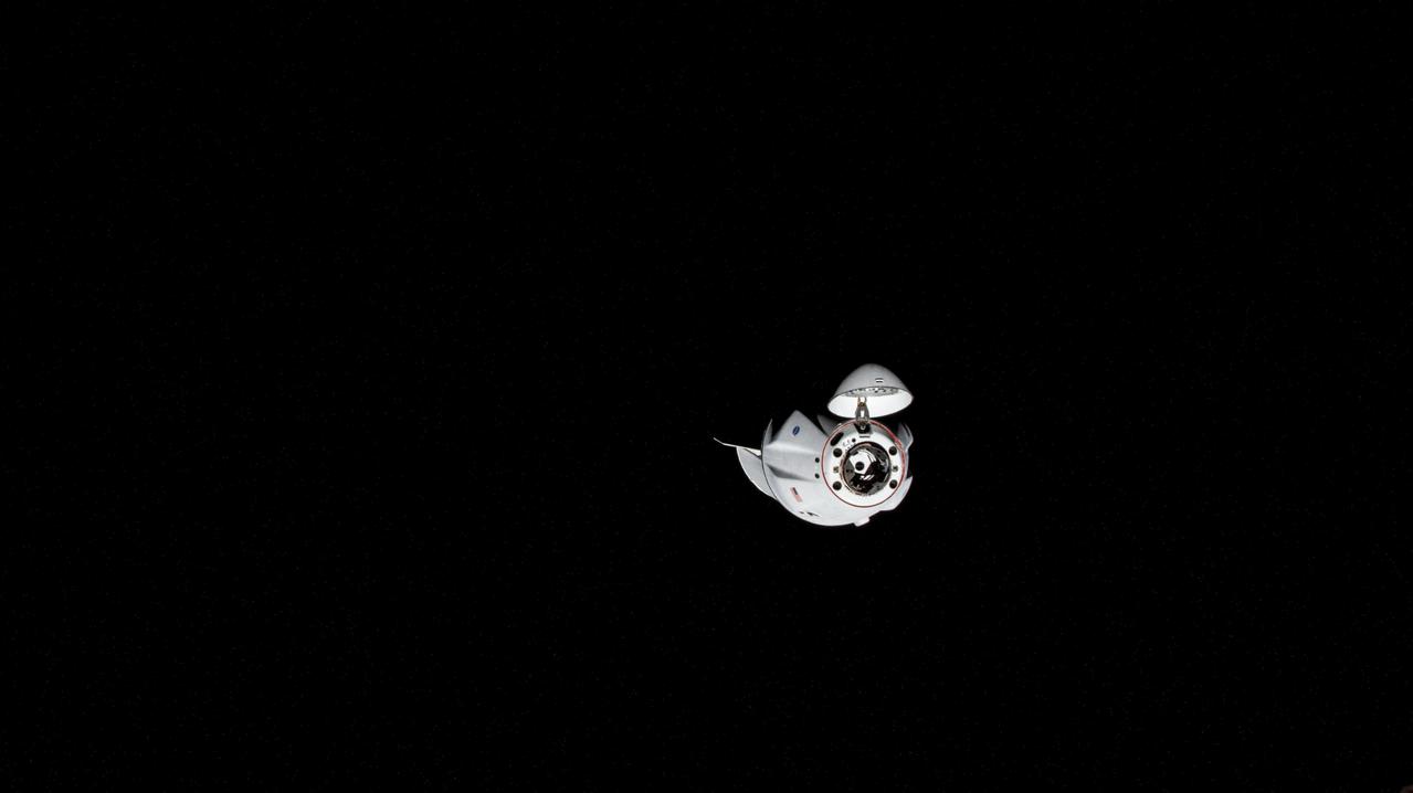 iss065e333870 (Aug. 30, 2021) --- The SpaceX Cargo Dragon vehicle approaches the International Space Station for an autonomous docking to the Harmony module's forward international docking adapter.