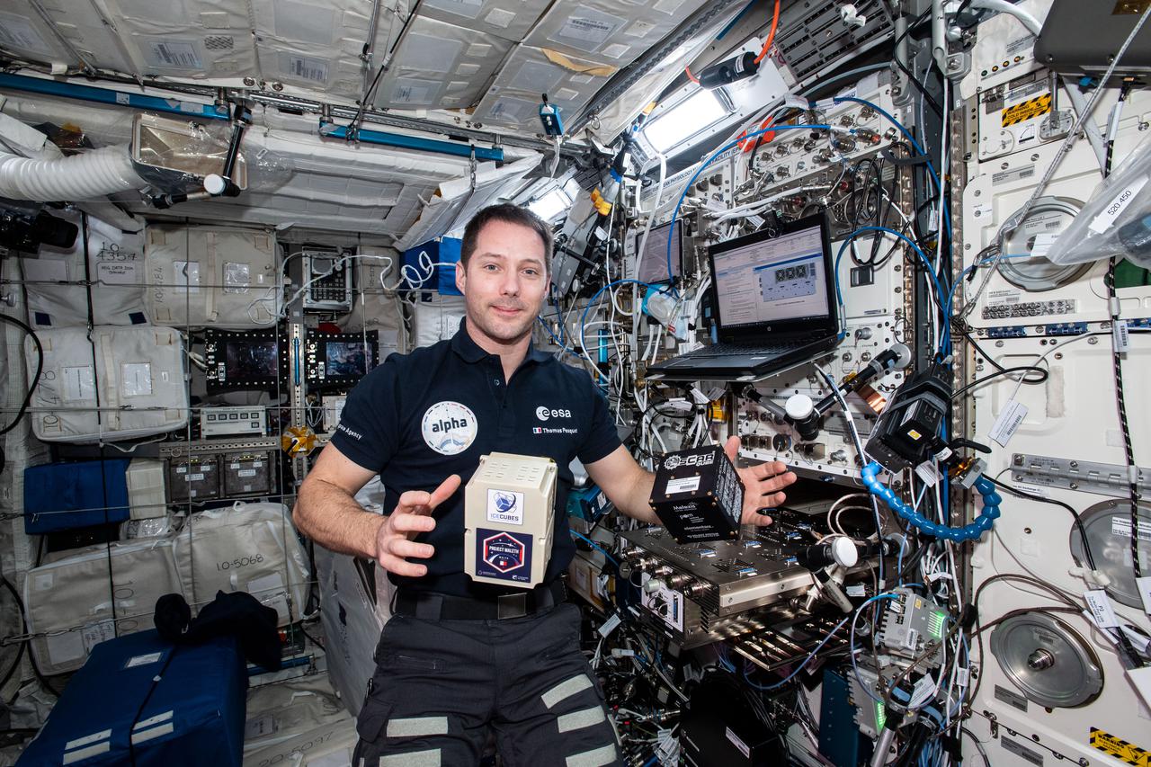 iss065e343725 (9/2/2021) --- European Space Agency (ESA) astronaut Thomas Pesquet is pictured aboard the International Space Station Columbus module with the Ice Cube #8 and #9  BioCubes. The Ice Cube #8 investigation uses quantum technology to produce high-resolution, high-precision measurements of the local magnetic field to create a high-resolution map of the Earth’s magnetic field. Ice Cube #9 seeks to analize the Skin Microbiome of Diabetic Foot Ulcers