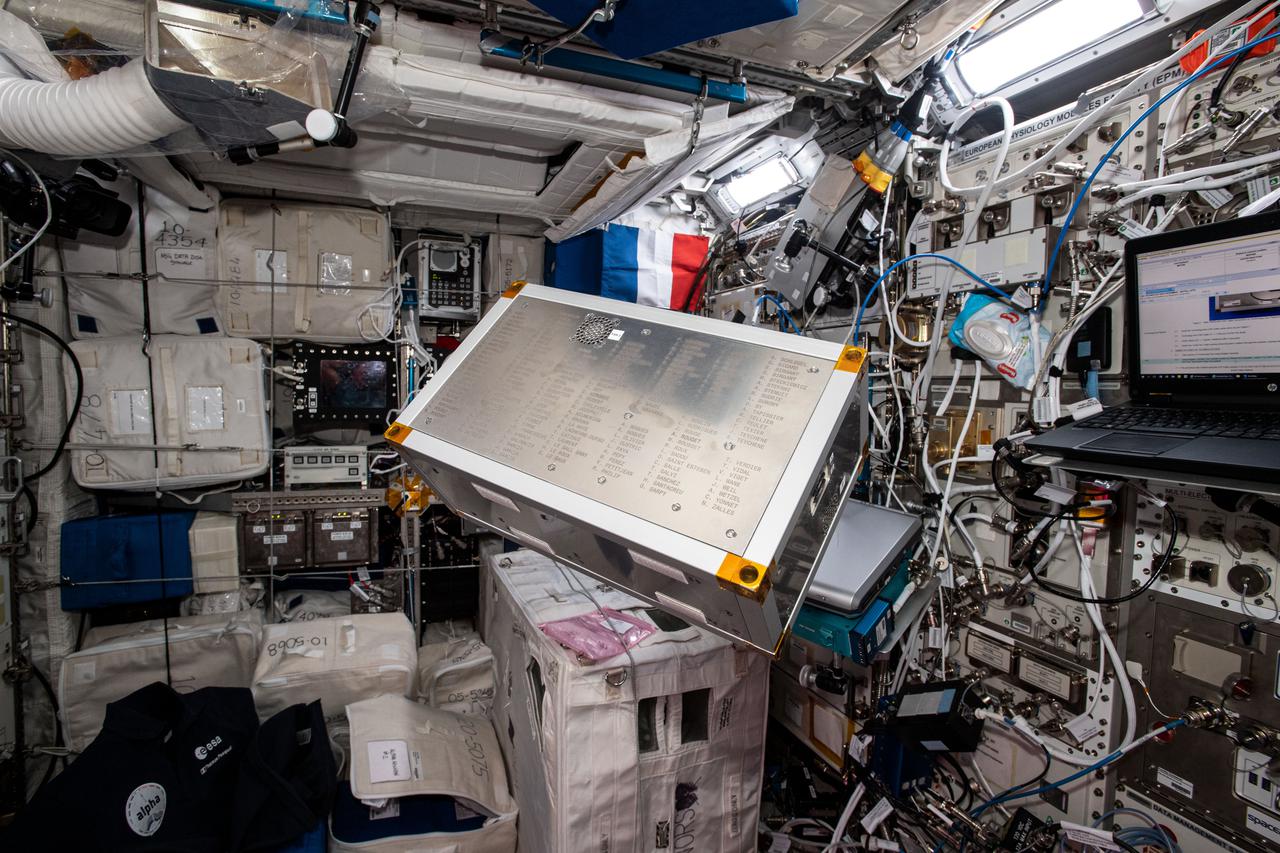 iss065e347840 (9/3/2021) --- A view of the technology Box investigation in the columbus module aboard the International Space Station (ISS). The main objective of Technology Box (Tetr’ISS) is to conduct experiments gathered in support equipment called ‘Platform’, to illustrate science principles based on physics and chemistry. For this mission Tetr’ISS contains the Chladni’s Figures experiment: a physical science experiment to observe the sound waves in 3D thanks to fine particles organized according to nodes and antinodes.
