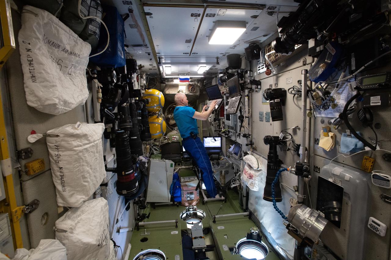 iss065e349549 (Sept. 4, 2021) --- Roscosmos cosmonaut and Expedition 65 Flight Engineer Oleg Novitskiy is in the Zvezda service module the day after a spacewalk that he and fellow cosmonaut Pyotr Dubrov conducted to begin configuring the Nauka multipurpose laboratory module for science operations.