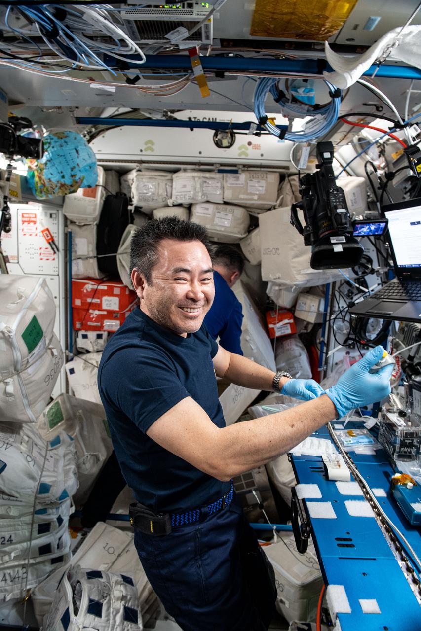 iss065e369726 (Sept. 9, 2021) --- Expedition 65 Commander Akihiko Hoshide of the Japan Aerospace Exploration Agency (JAXA) conducts research using DNA sequencing to help monitor and identify microbes on spacecraft to increase the safety of future human missions to the Moon, Mars and beyond.